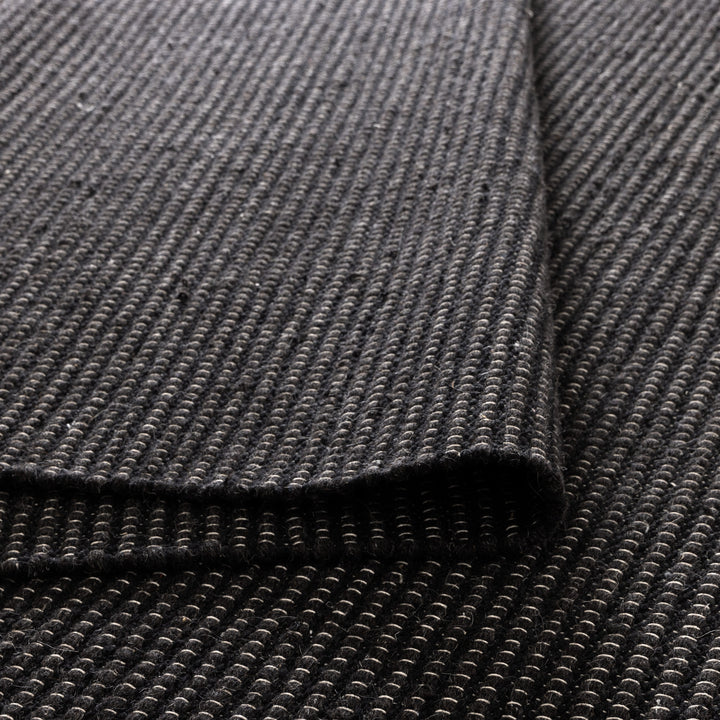 NATURA BLACK WOOL RUG