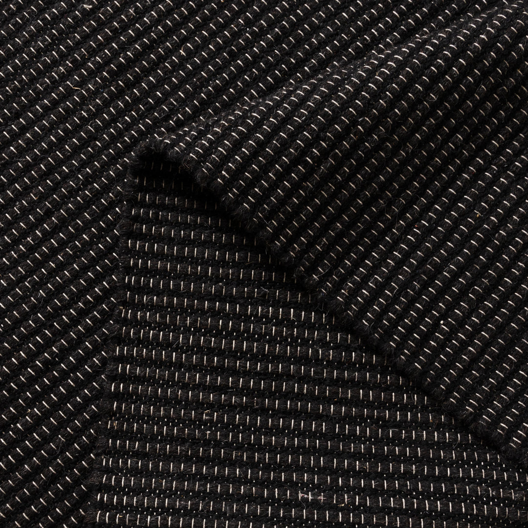 NATURA BLACK WOOL RUG
